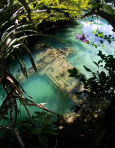japanese wwii warplane lies wrecked in tropical riverbed in v0 zc68nusp91n61